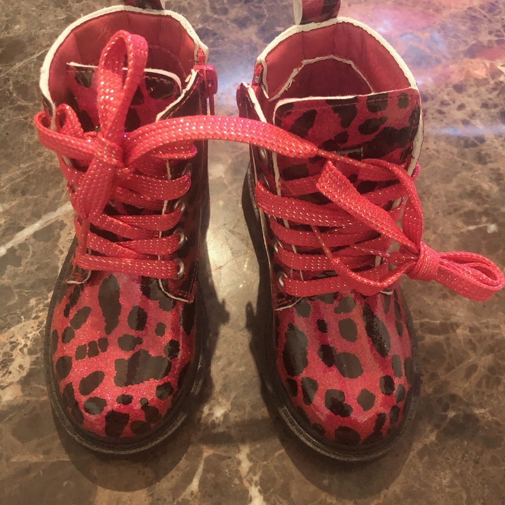 Pink and black boots